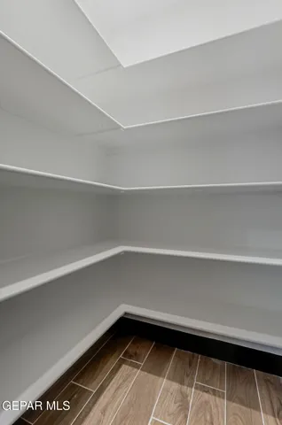 a view of a room with shelves