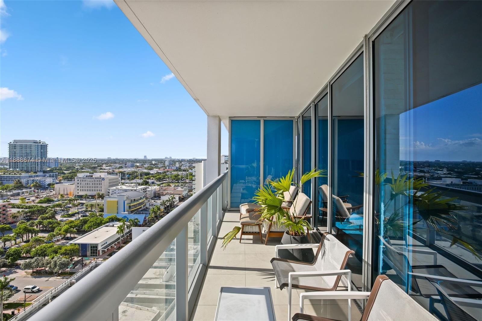 6899 Collins Avenue, Unit 1610 Miami Beach, FL 33141 - Photo 11 of 35 a view of balcony with chairs