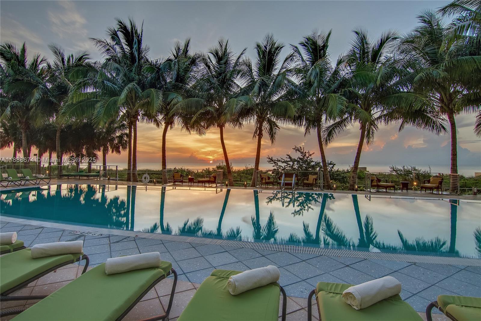 6899 Collins Avenue, Unit 1610 Miami Beach, FL 33141 - Photo 35 of 35 a view of lake with a table and chairs