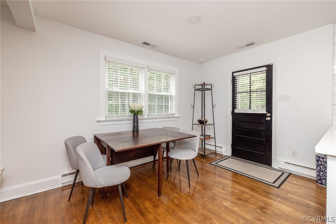 10500 Spring Run Road Chesterfield, VA 23832 - Photo 9 of 43 a view of a dining room with furniture window and wooden floor