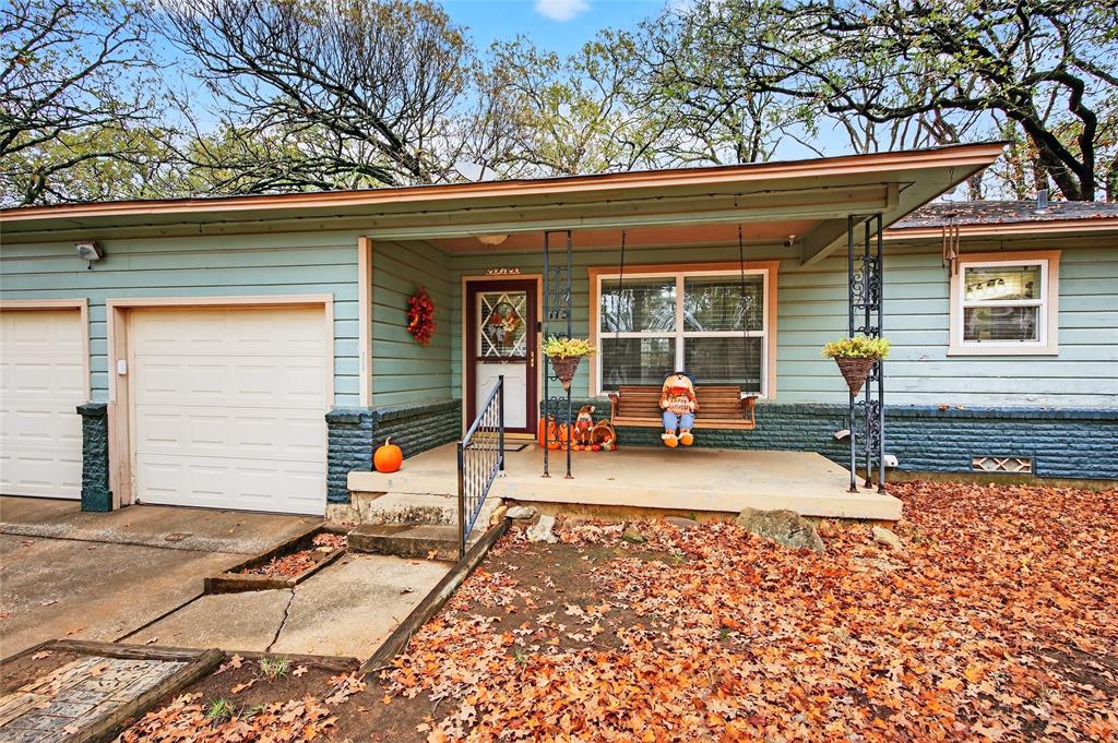 1115 Oak Ridge Drive Denison, TX 75020 - Photo 4 of 32 a view of a house with patio outdoor seating space