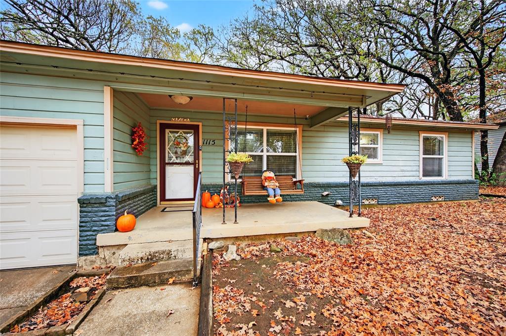 1115 Oak Ridge Drive Denison, TX 75020 - Photo 5 of 32 a view of a house with a patio