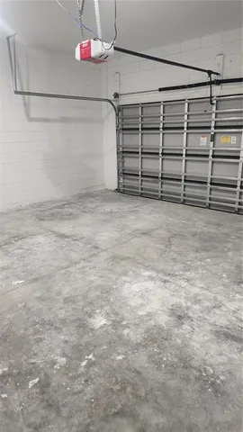 a view of a garage with stairs