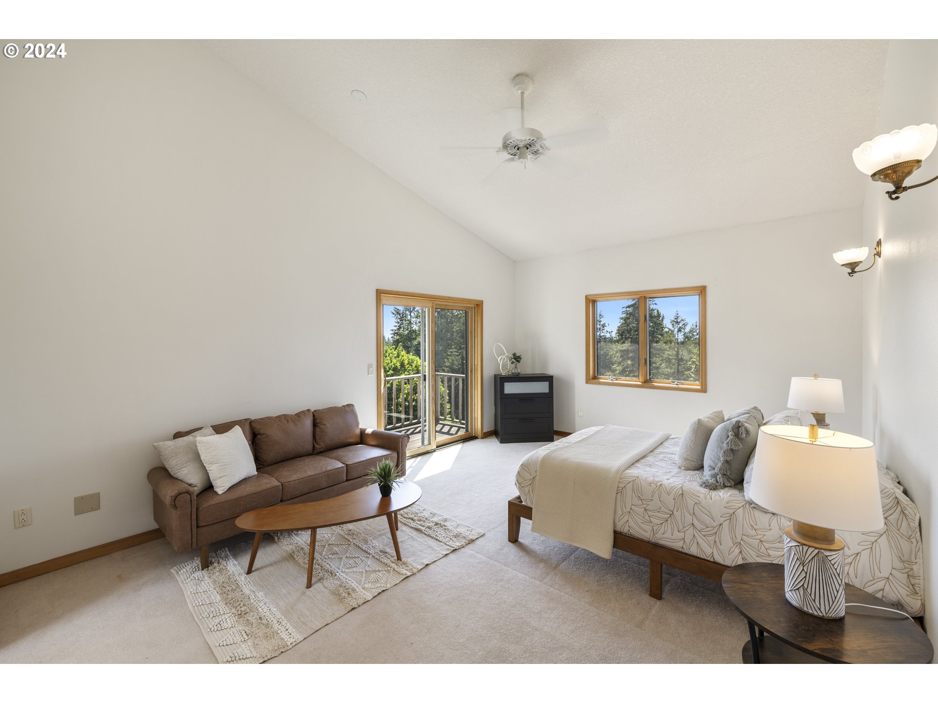 11400 Northwest Plainview Road Portland, OR 97231 - Photo 20 of 48 a bedroom with furniture and a couch