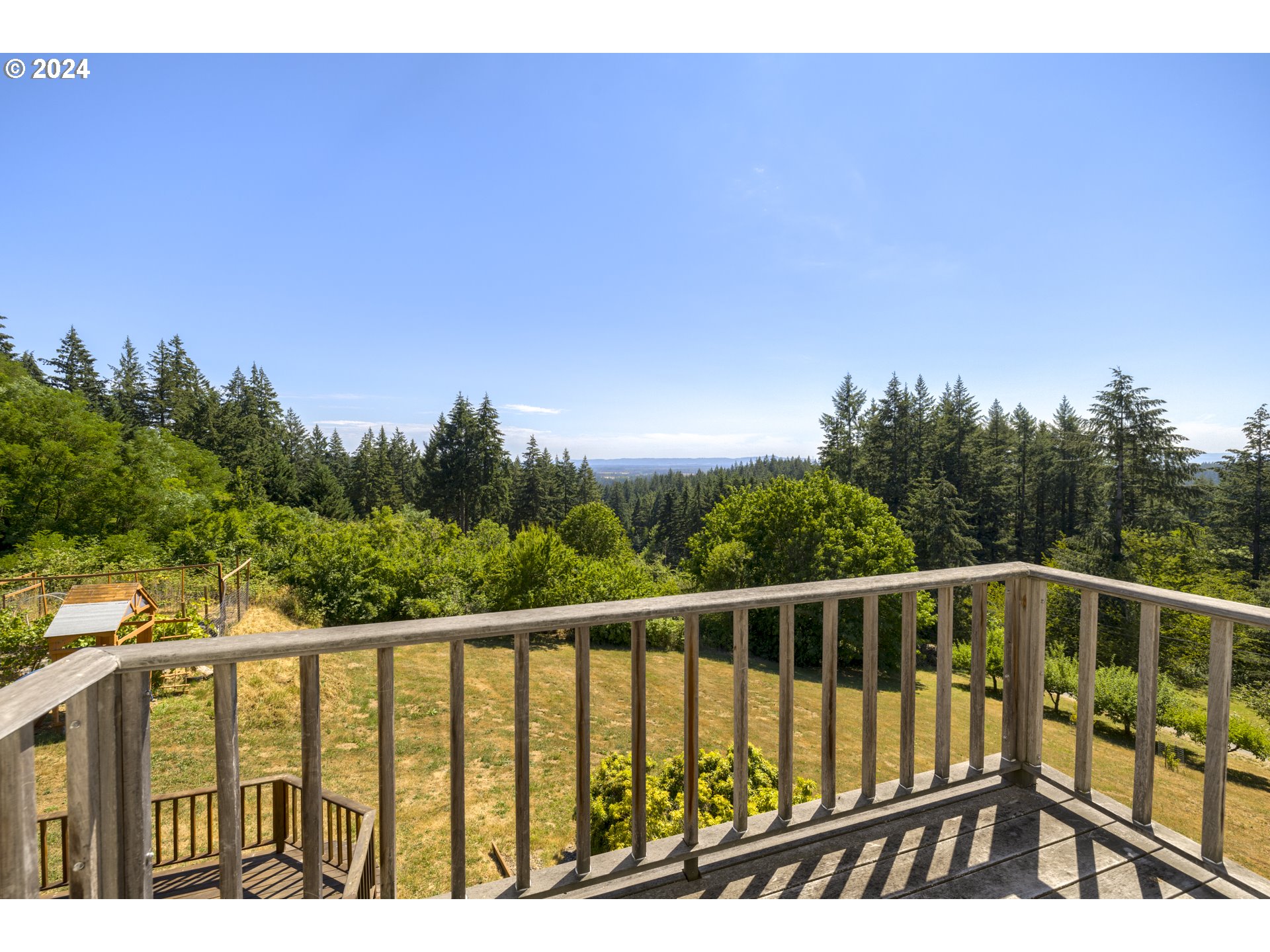 11400 Northwest Plainview Road Portland, OR 97231 - Photo 22 of 48 a view of balcony with wooden floor and fence