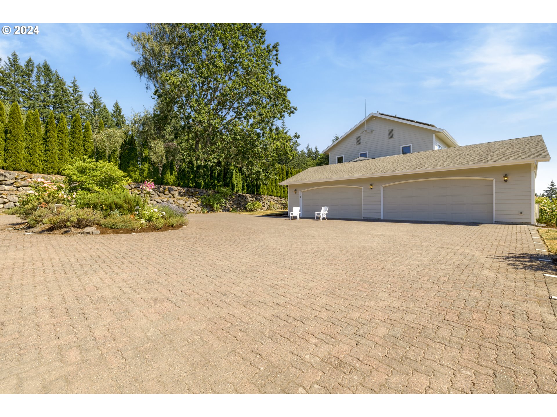 11400 Northwest Plainview Road Portland, OR 97231 - Photo 47 of 48 a white house with a outdoor space