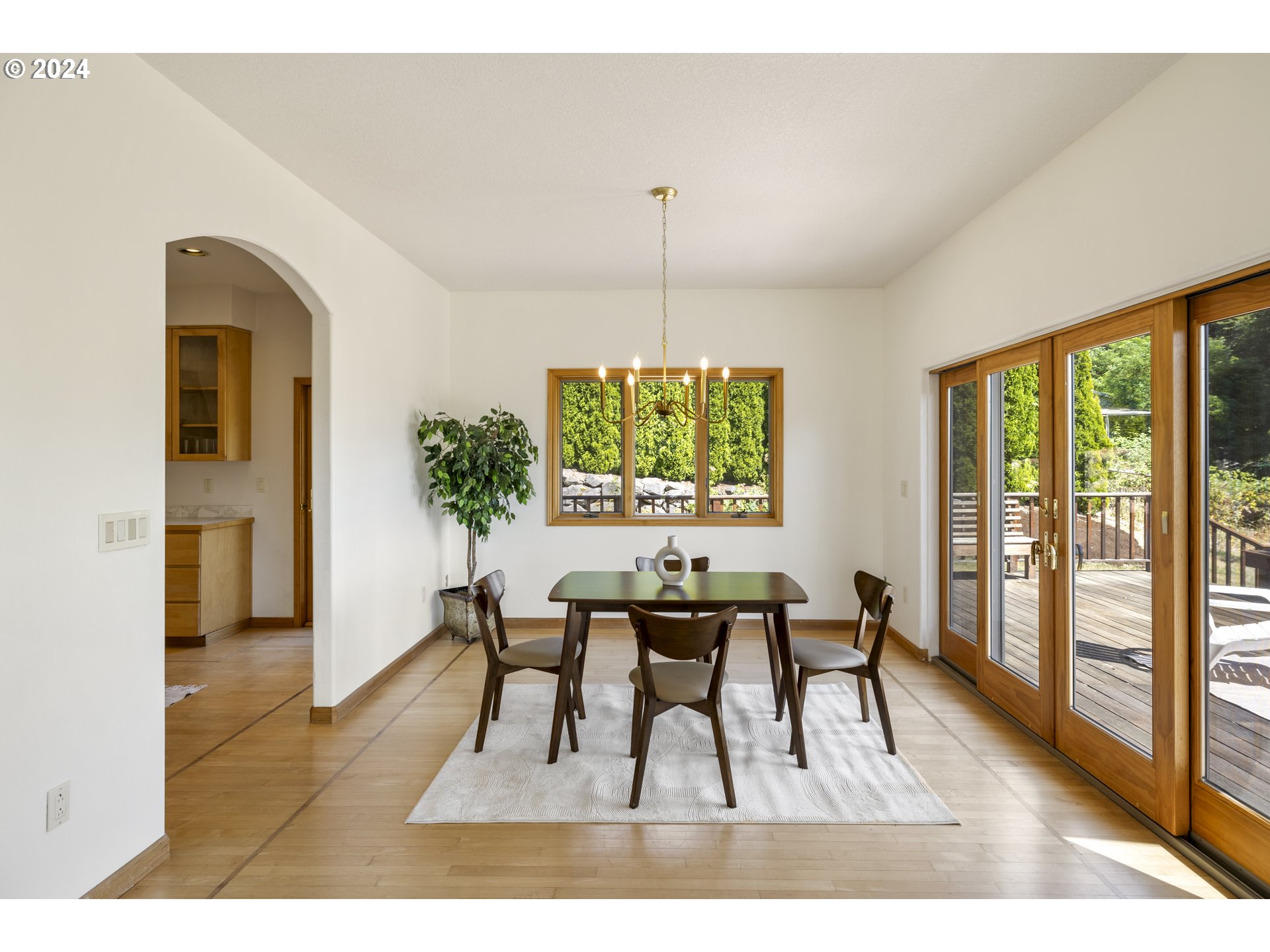 11400 Northwest Plainview Road Portland, OR 97231 - Photo 7 of 48 a dining room with furniture window and wooden floor
