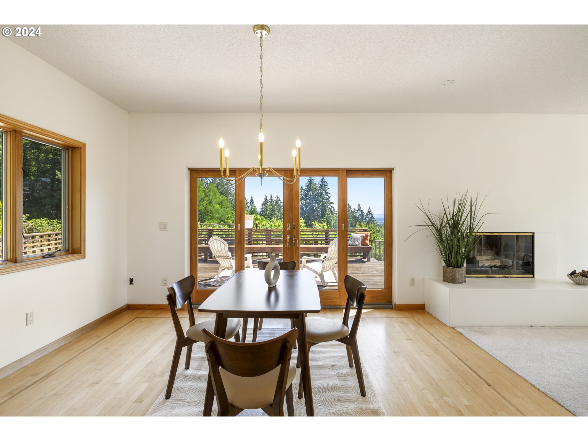 11400 Northwest Plainview Road Portland, OR 97231 - Photo 10 of 48 a view of a dining room with furniture window and wooden floor
