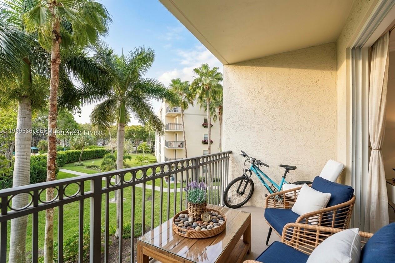 26 Royal Palm Way, Unit 304 Boca Raton, FL 33432 - Photo 1 of 38 a view of balcony with furniture and potted plants