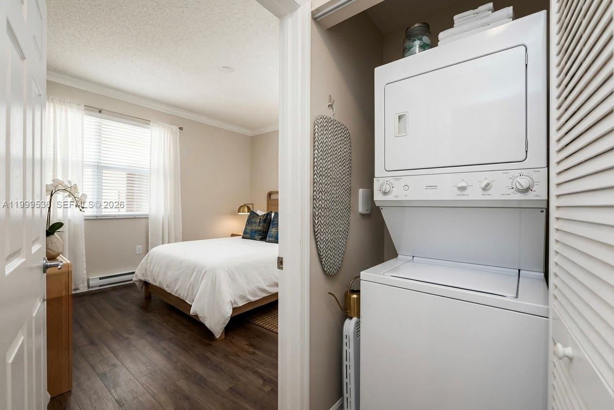 26 Royal Palm Way, Unit 304 Boca Raton, FL 33432 - Photo 20 of 38 a bedroom with a bed and a window