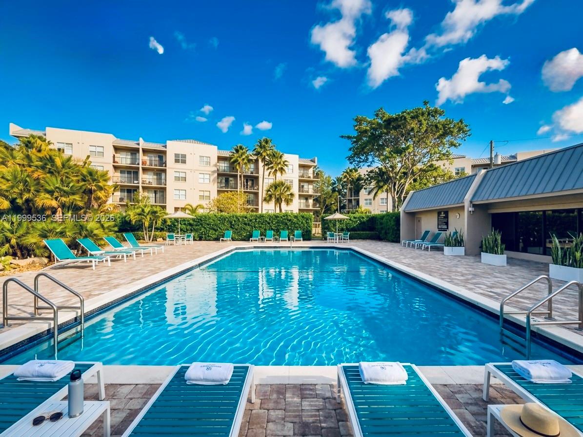 26 Royal Palm Way, Unit 304 Boca Raton, FL 33432 - Photo 35 of 38 a swimming pool view with a outdoor space