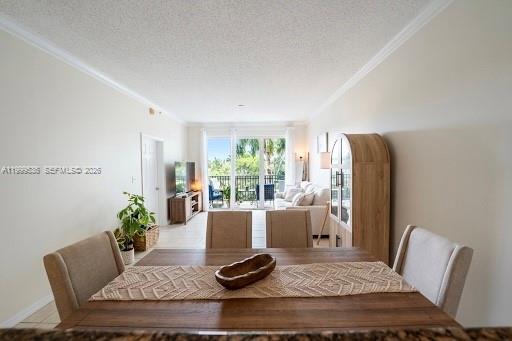 26 Royal Palm Way, Unit 304 Boca Raton, FL 33432 - Photo 6 of 38 a living room with furniture and a potted plant