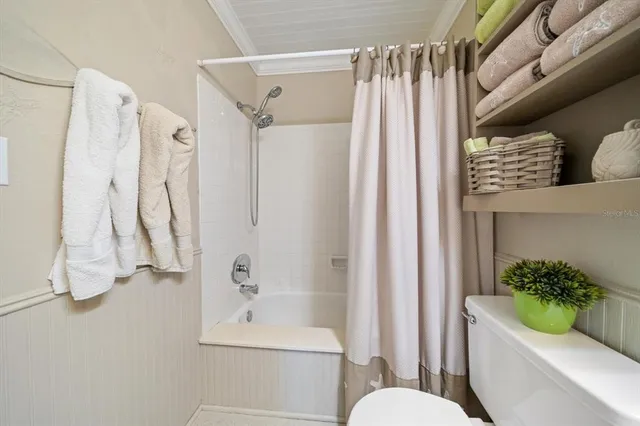 a view of a hallway with washer and dryer