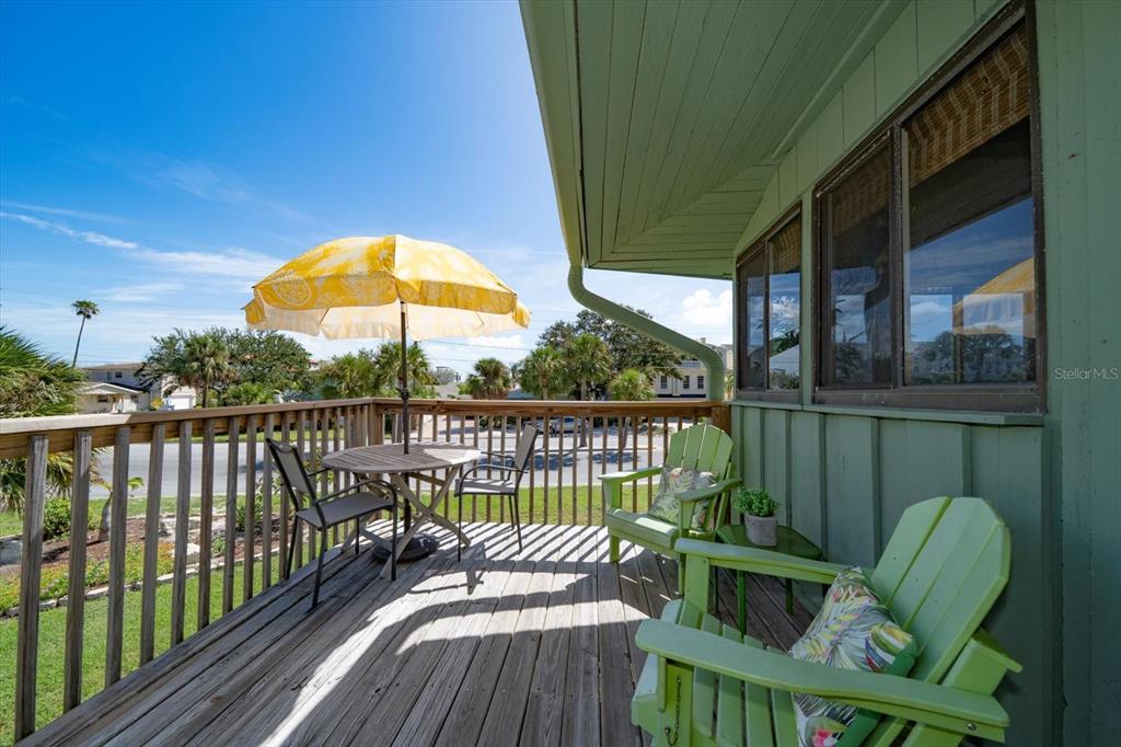 800 East Gulf Boulevard, Unit 5 Indian Rocks Beach, FL 33785 - Photo 6 of 52 a view of a two chairs in the balcony