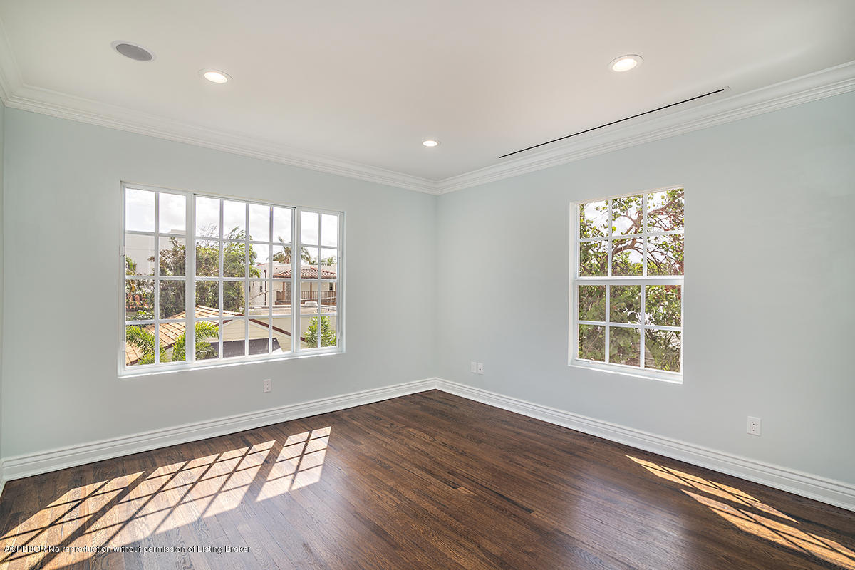 230 Murray Road West Palm Beach, FL 33405 - Photo 18 of 33 a view of an empty room with wooden floor and a window