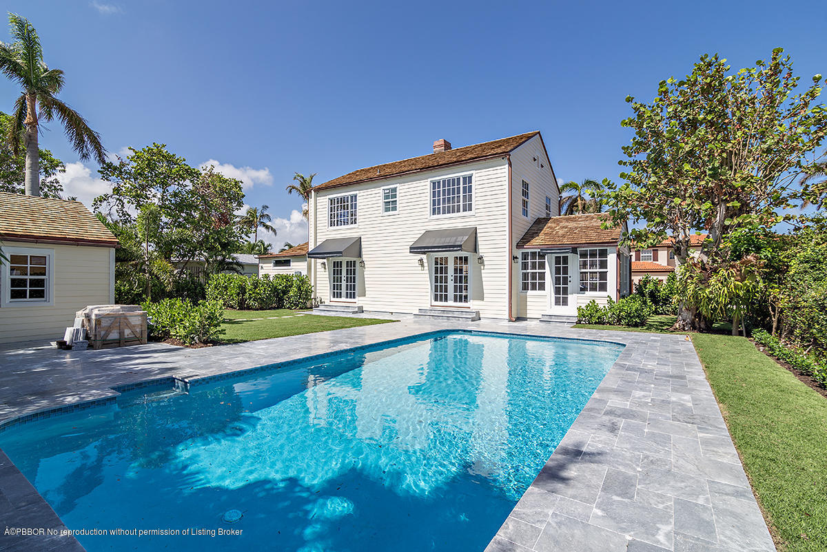 230 Murray Road West Palm Beach, FL 33405 - Photo 22 of 33 a house with swimming pool in front of it