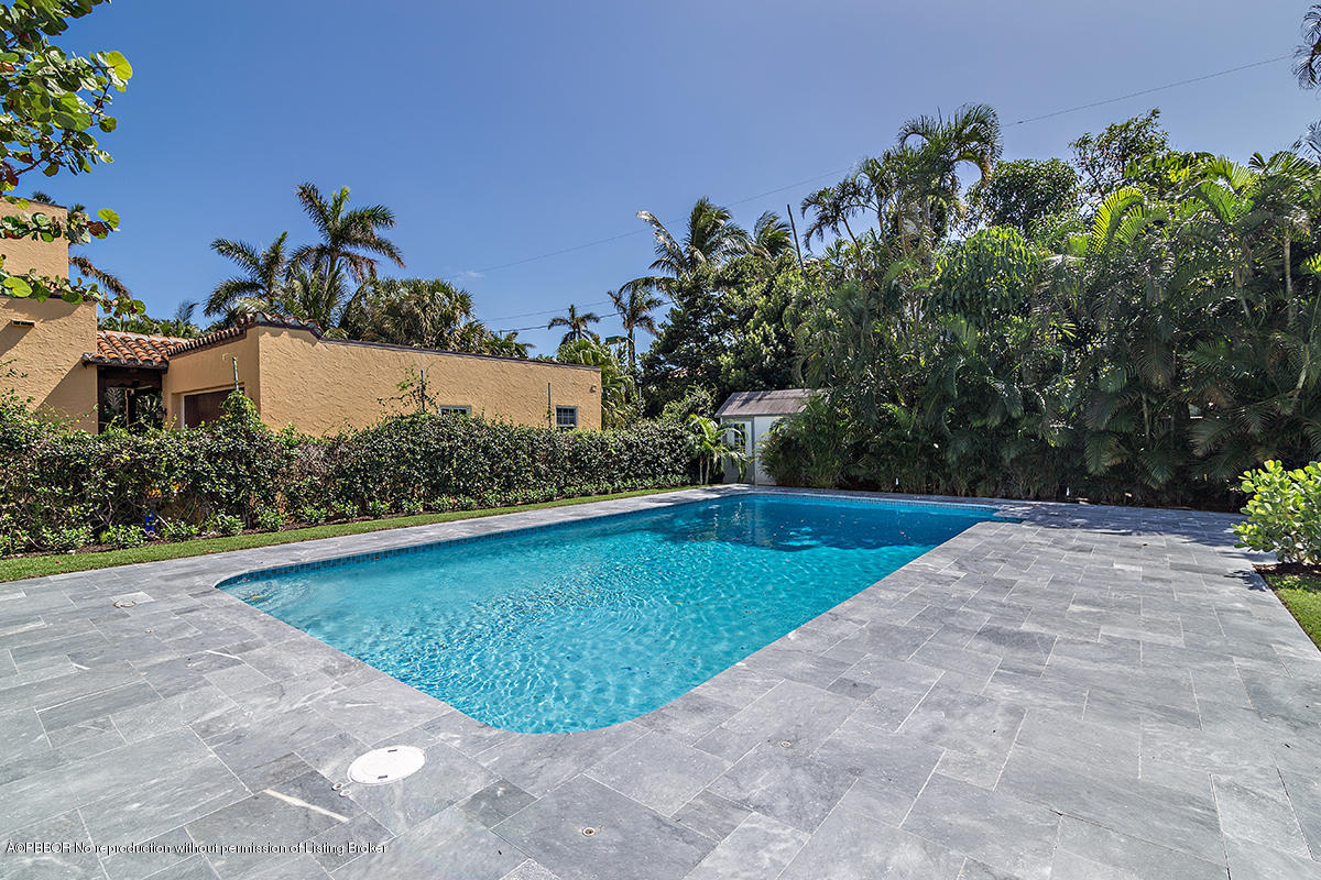 230 Murray Road West Palm Beach, FL 33405 - Photo 24 of 33 a view of a swimming pool and lounge chair