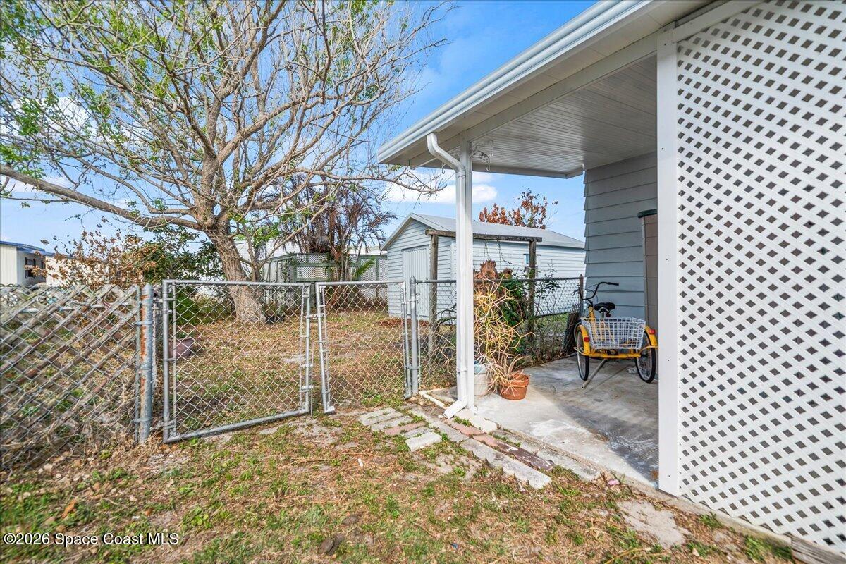 1848 Seagrape Street Northeast Palm Bay, FL 32905 - Photo 21 of 27 a view of a backyard