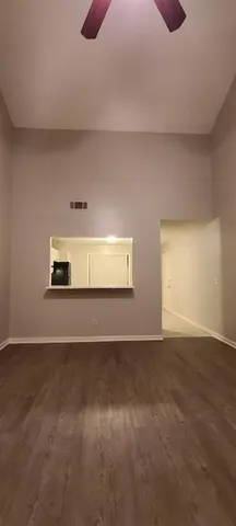 a view of an empty room and window