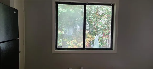a view of a room that has a window