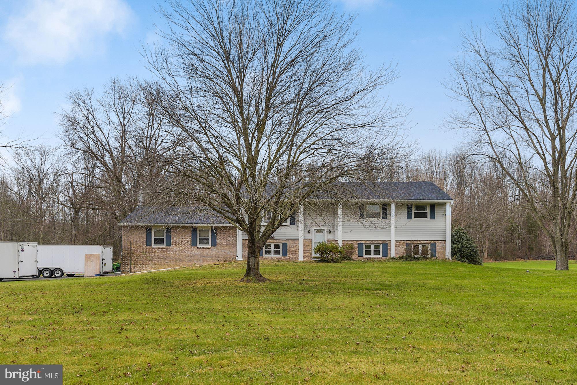 221 Arneys Mt Road Pemberton, NJ 08068 - Photo 1 of 28 a front view of a house with a garden