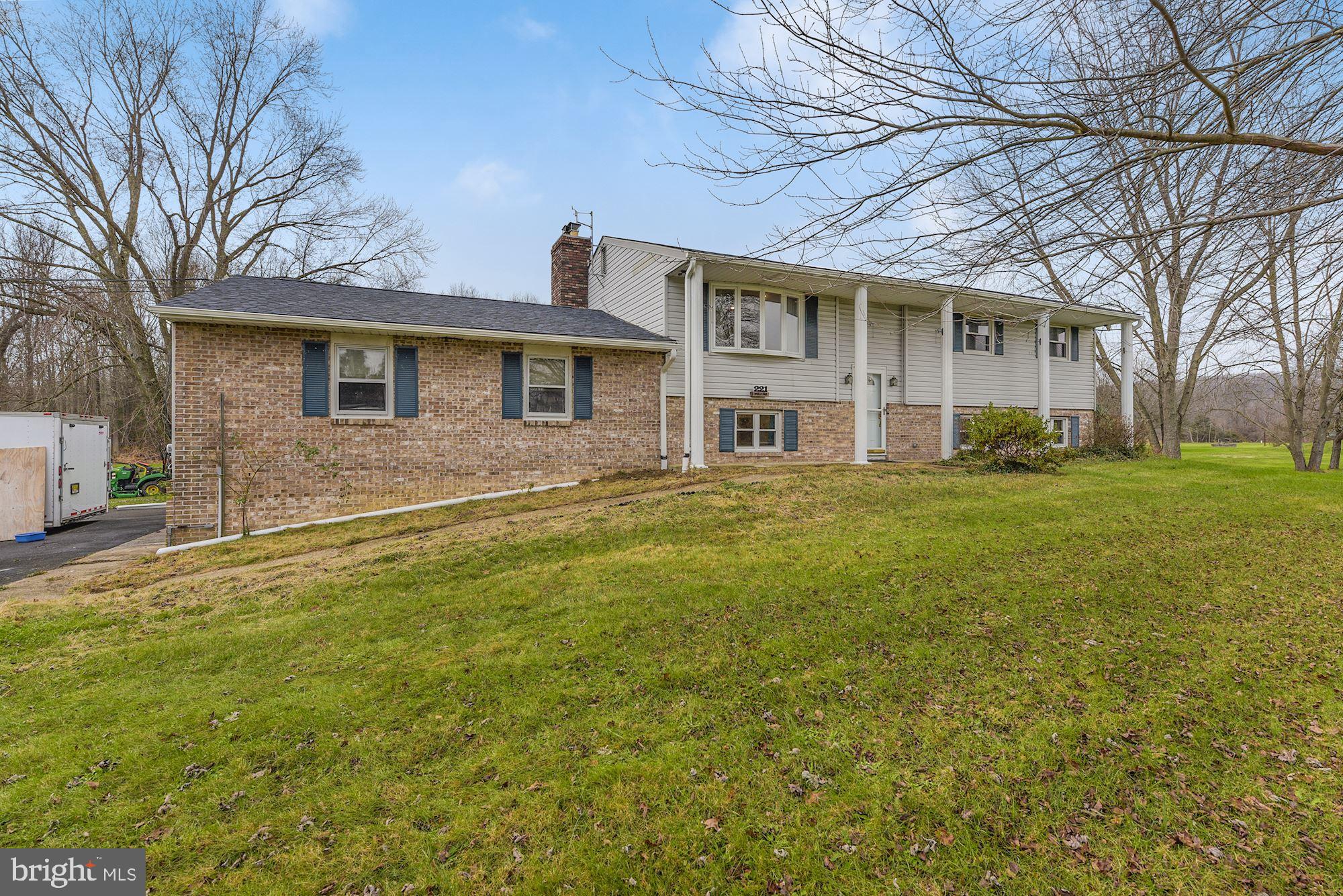 221 Arneys Mt Road Pemberton, NJ 08068 - Photo 2 of 28 a front view of a house with a garden