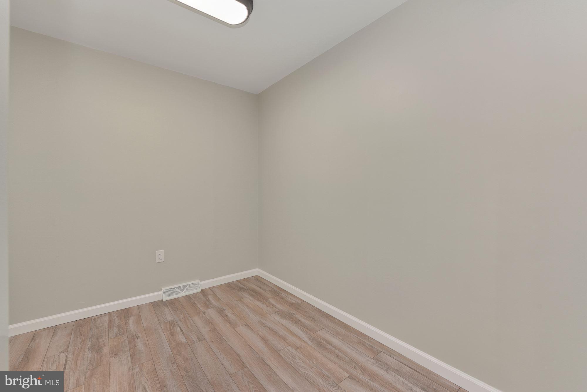 221 Arneys Mt Road Pemberton, NJ 08068 - Photo 13 of 28 a view of an empty room with wooden floor