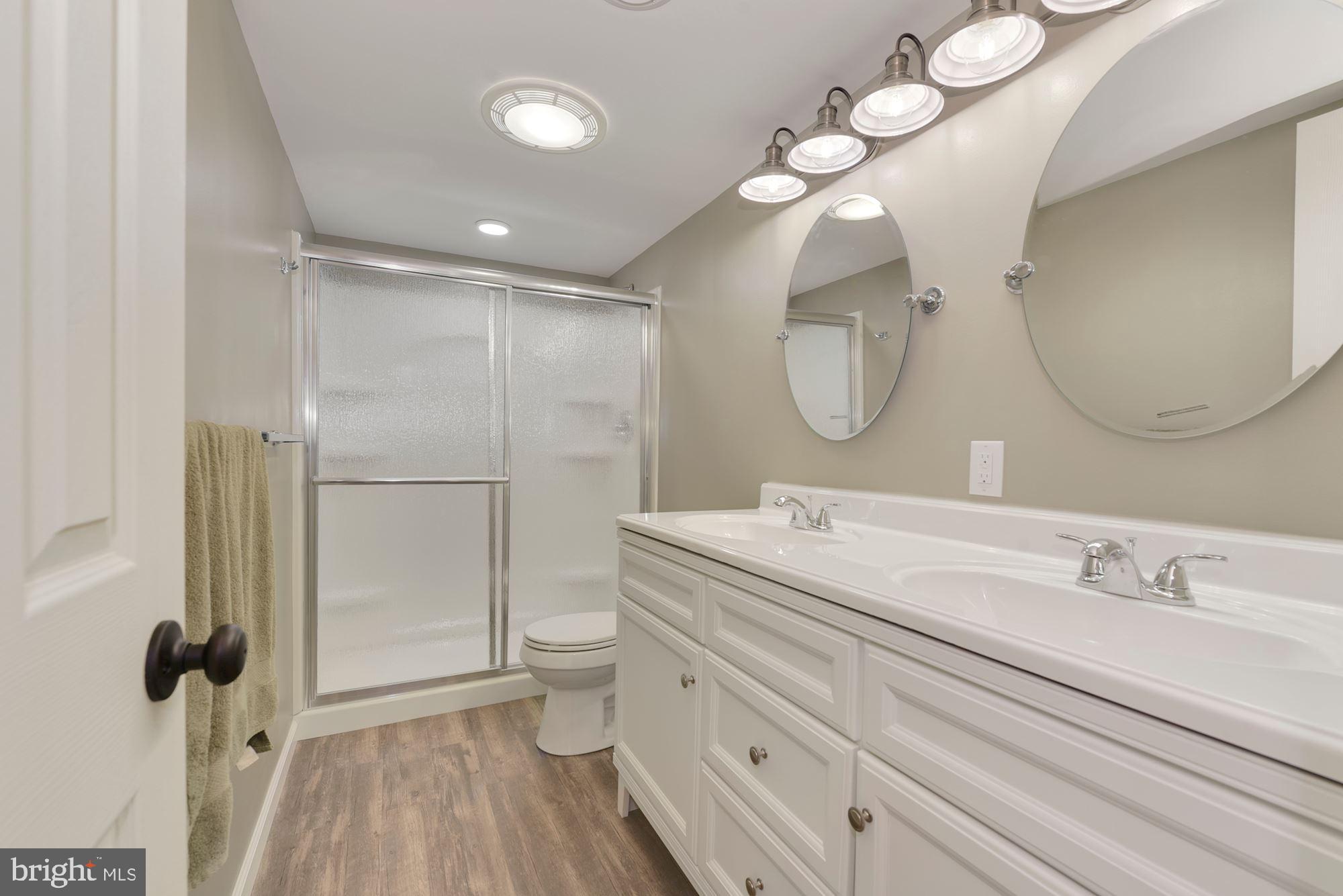 221 Arneys Mt Road Pemberton, NJ 08068 - Photo 19 of 28 a bathroom with a toilet a sink and mirror