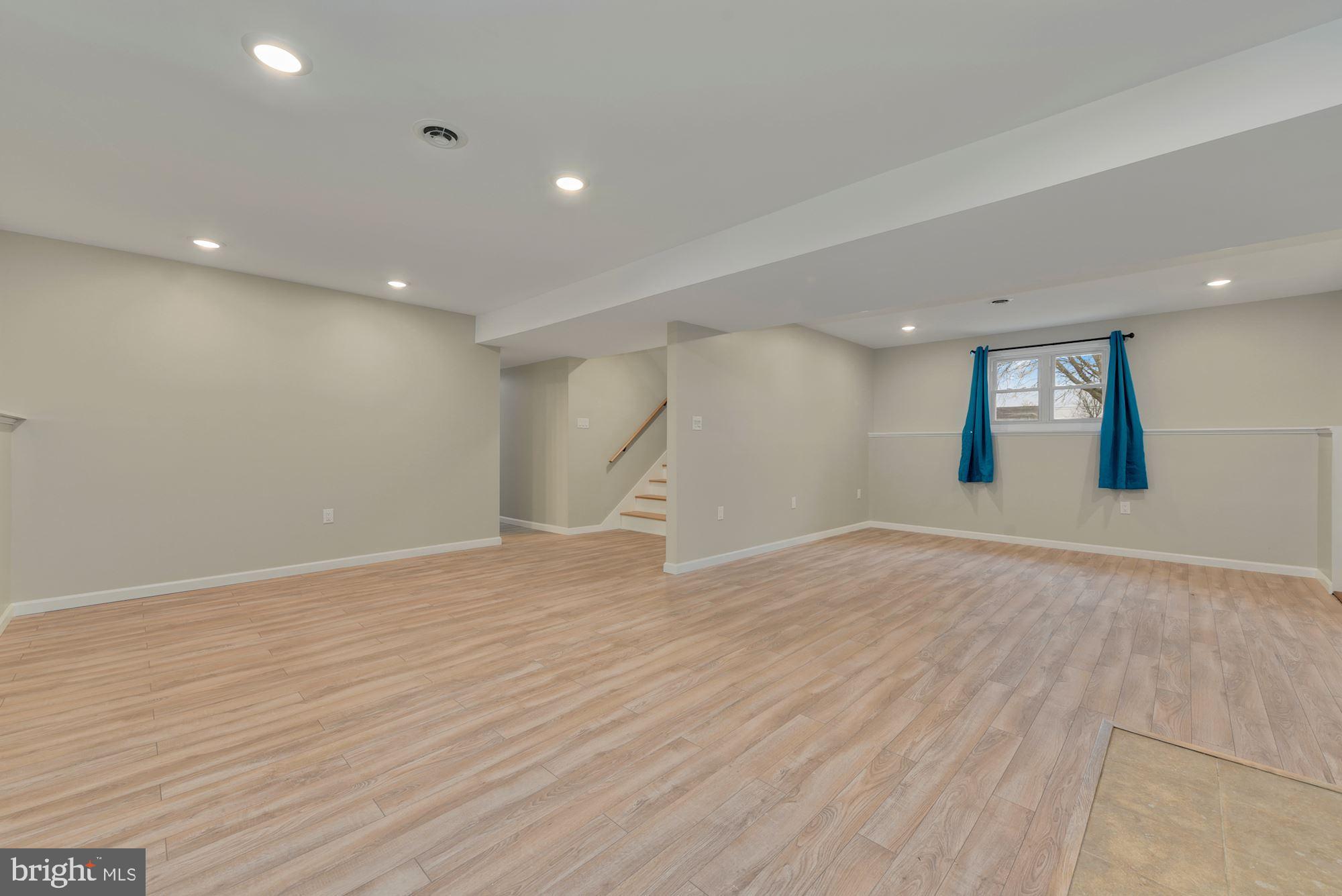 221 Arneys Mt Road Pemberton, NJ 08068 - Photo 25 of 28 a view of empty room with wooden floor
