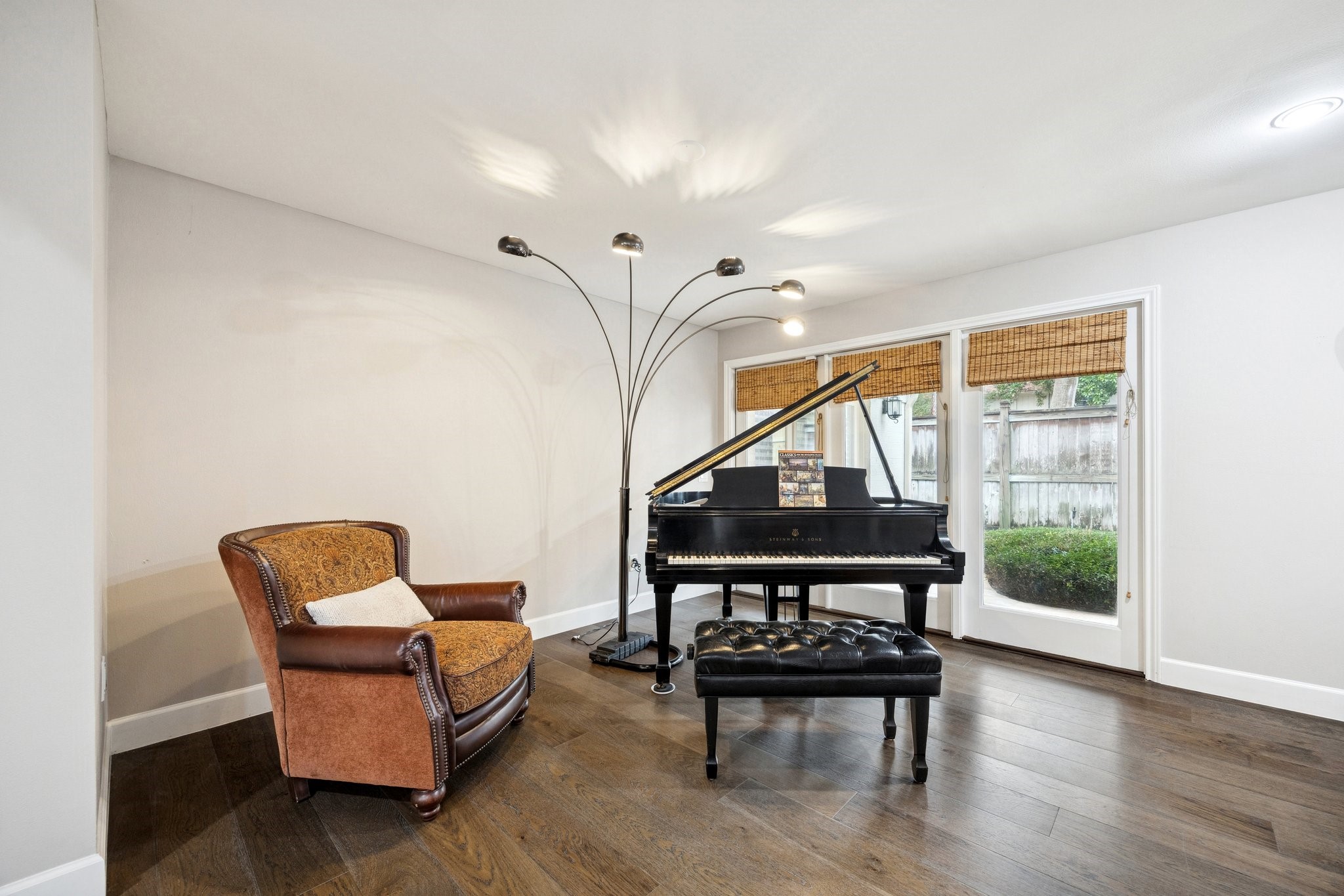 242 Vanderpool Lane Houston, TX 77024 - Photo 14 of 45 This family room features elegant engineered hardwood flooring and ample natural light from large french doors with bamboo shades. Again, a great space to make it whatever you want it to be.