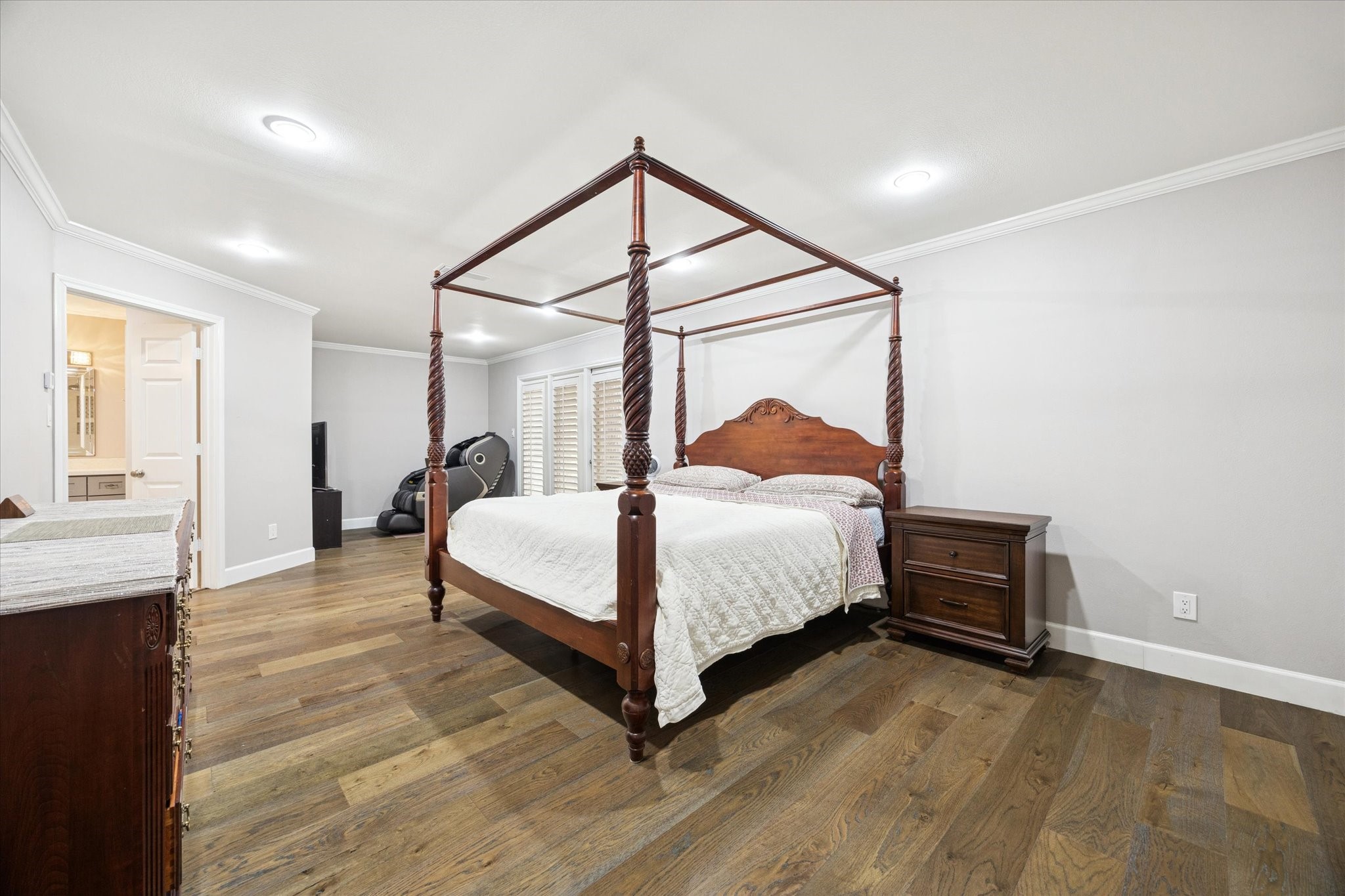 242 Vanderpool Lane Houston, TX 77024 - Photo 20 of 45 a bedroom with a bed table and a window