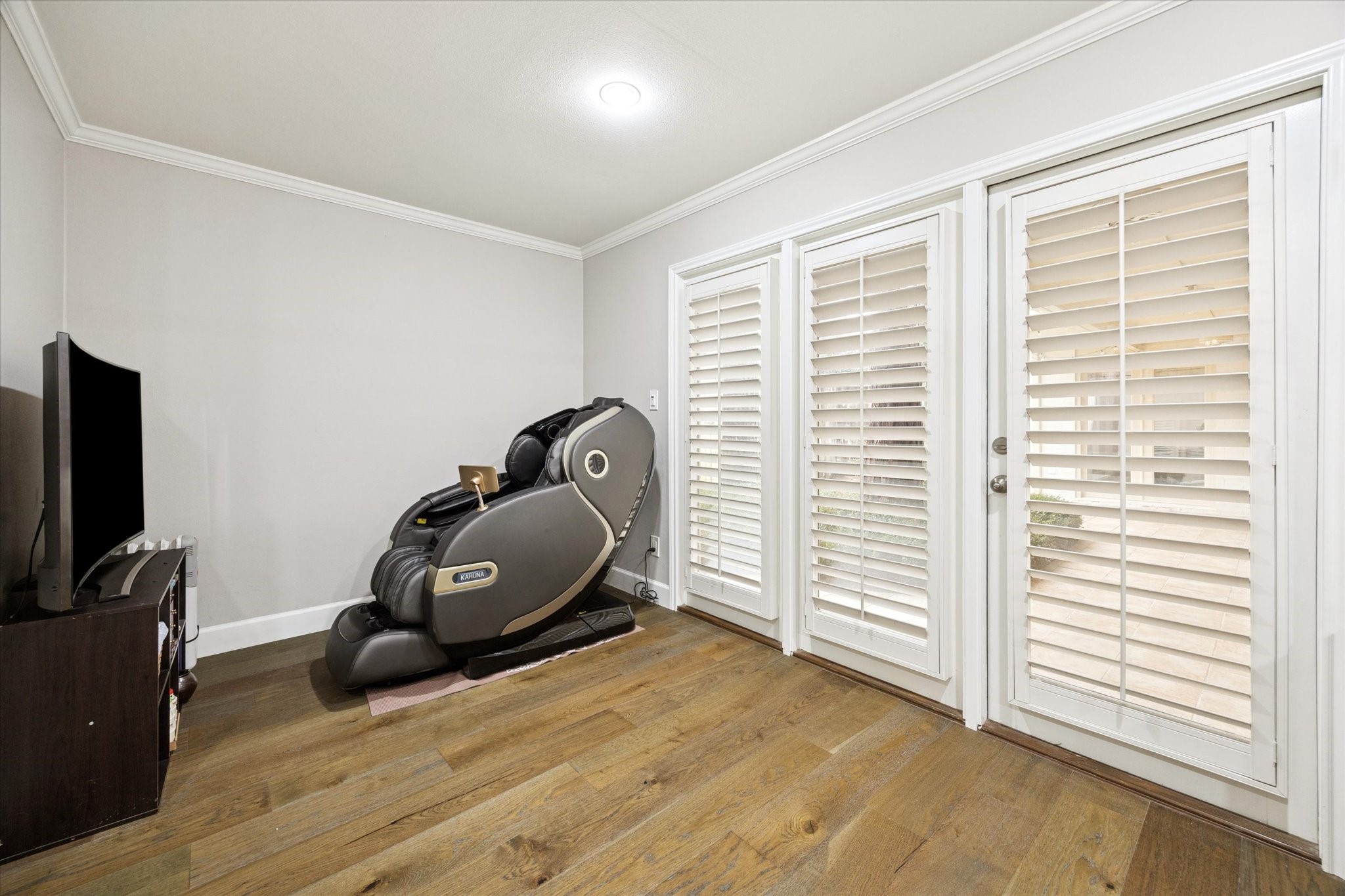 242 Vanderpool Lane Houston, TX 77024 - Photo 21 of 45 a view of a room with gym equipment