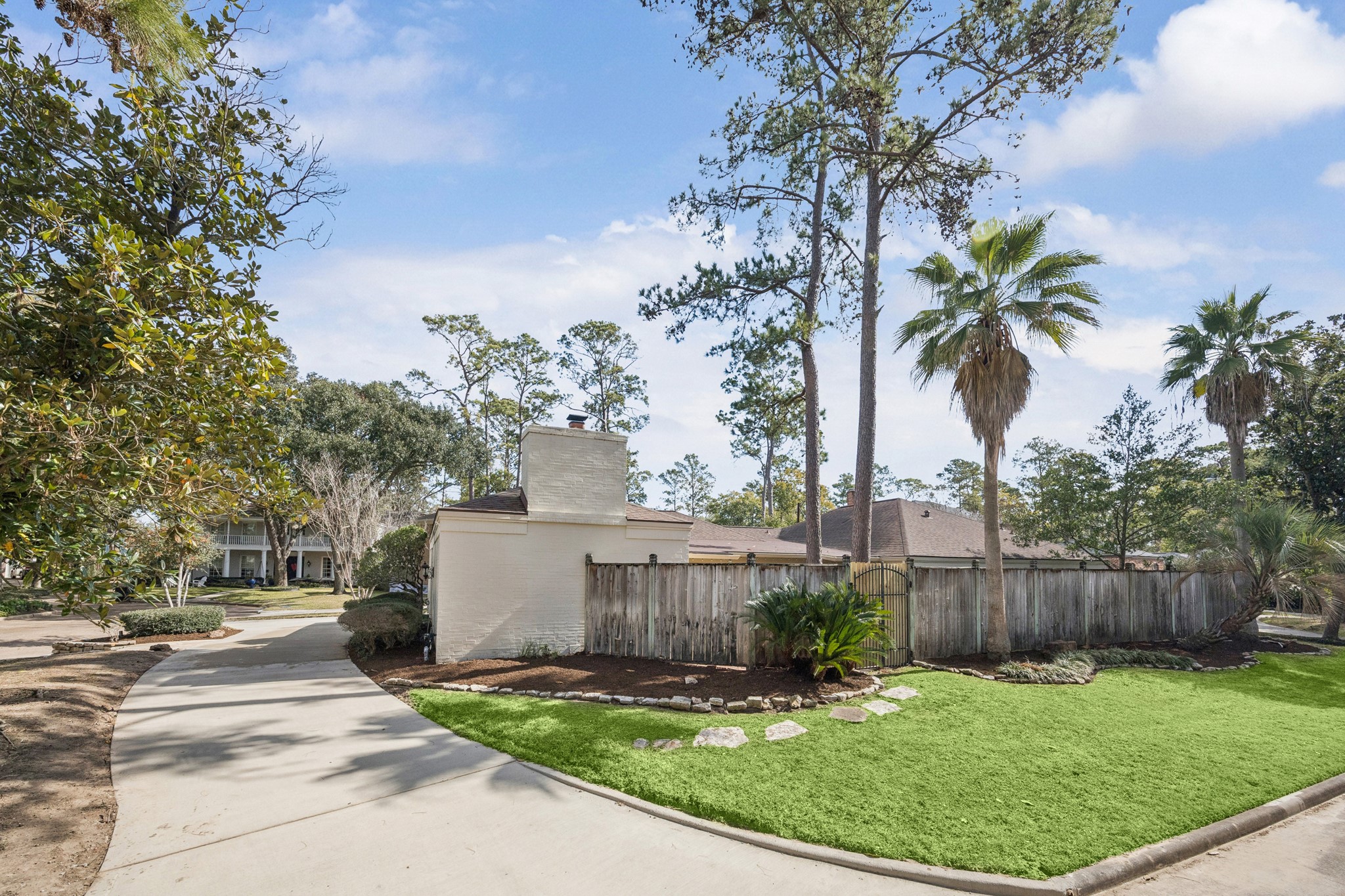 242 Vanderpool Lane Houston, TX 77024 - Photo 35 of 45 a view of a backyard with tree s