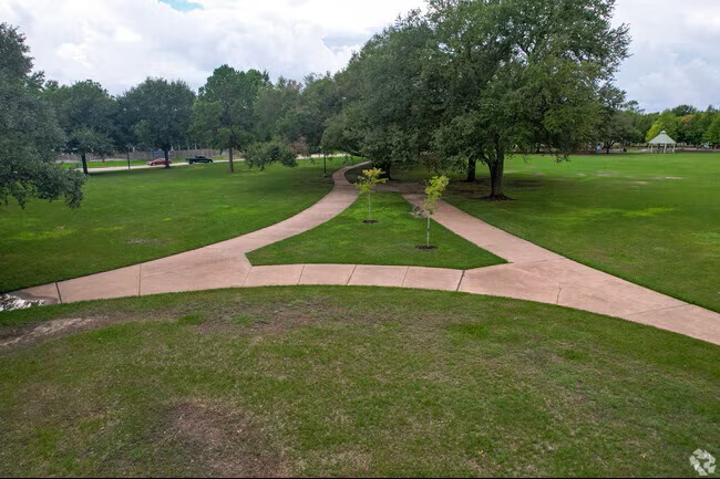 242 Vanderpool Lane Houston, TX 77024 - Photo 43 of 45 Enjoy serene strolls and lush greenery just 4 minutes away at Bendwood Park, enhancing your dream home's charm and convenience.