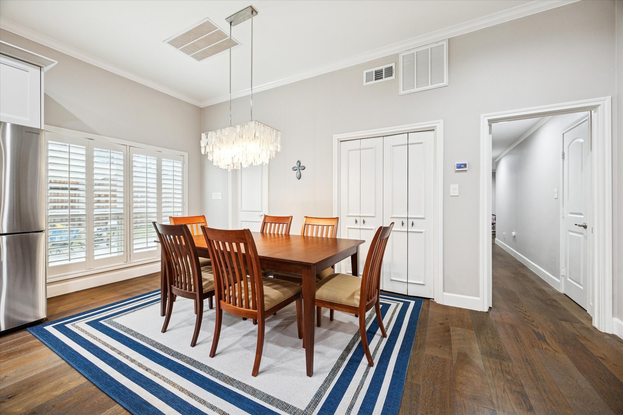 242 Vanderpool Lane Houston, TX 77024 - Photo 10 of 45 a view of a dining room with furniture window and wooden floor