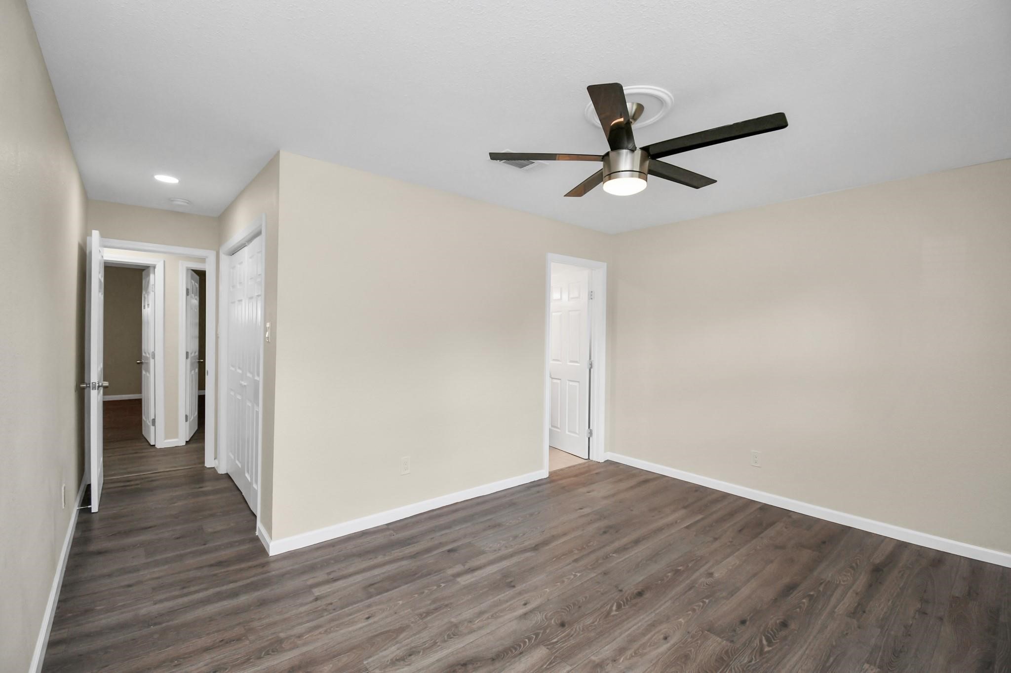 531 Edgebrook Drive Houston, TX 77034 - Photo 15 of 26 a view of empty room with wooden floor