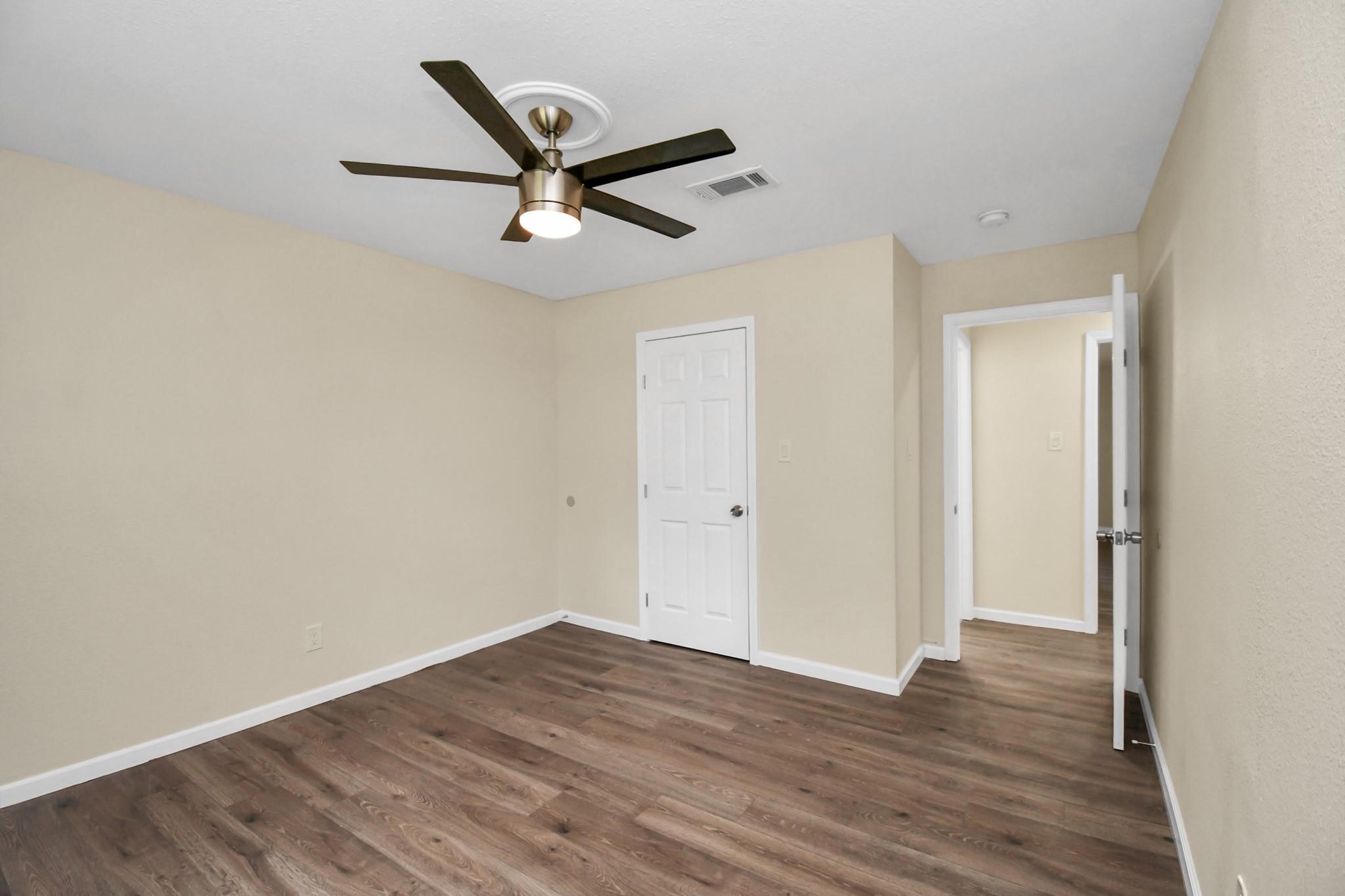 531 Edgebrook Drive Houston, TX 77034 - Photo 19 of 26 a view of a room with wooden floor