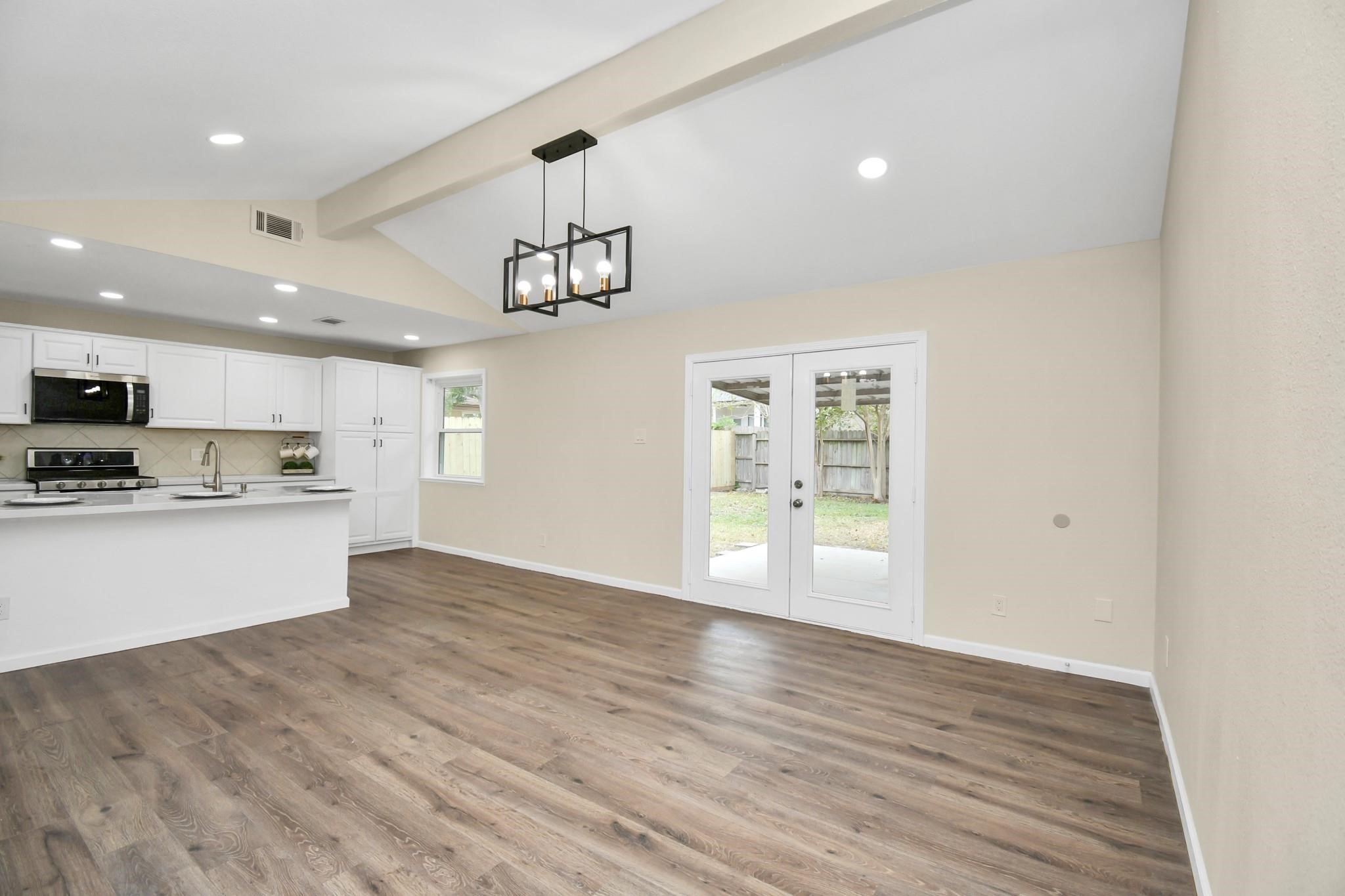 531 Edgebrook Drive Houston, TX 77034 - Photo 10 of 26 a view of kitchen with microwave and cabinets