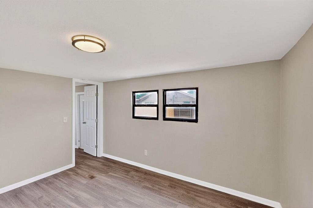 3112 Red River Street Melissa, TX 75454 - Photo 15 of 40 Unfurnished room with light wood-style flooring and baseboards