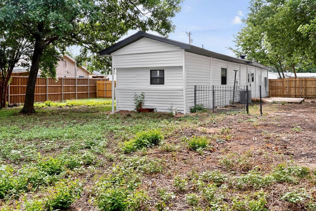 3112 Red River Street Melissa, TX 75454 - Photo 30 of 40 Rear view of property with a fenced backyard