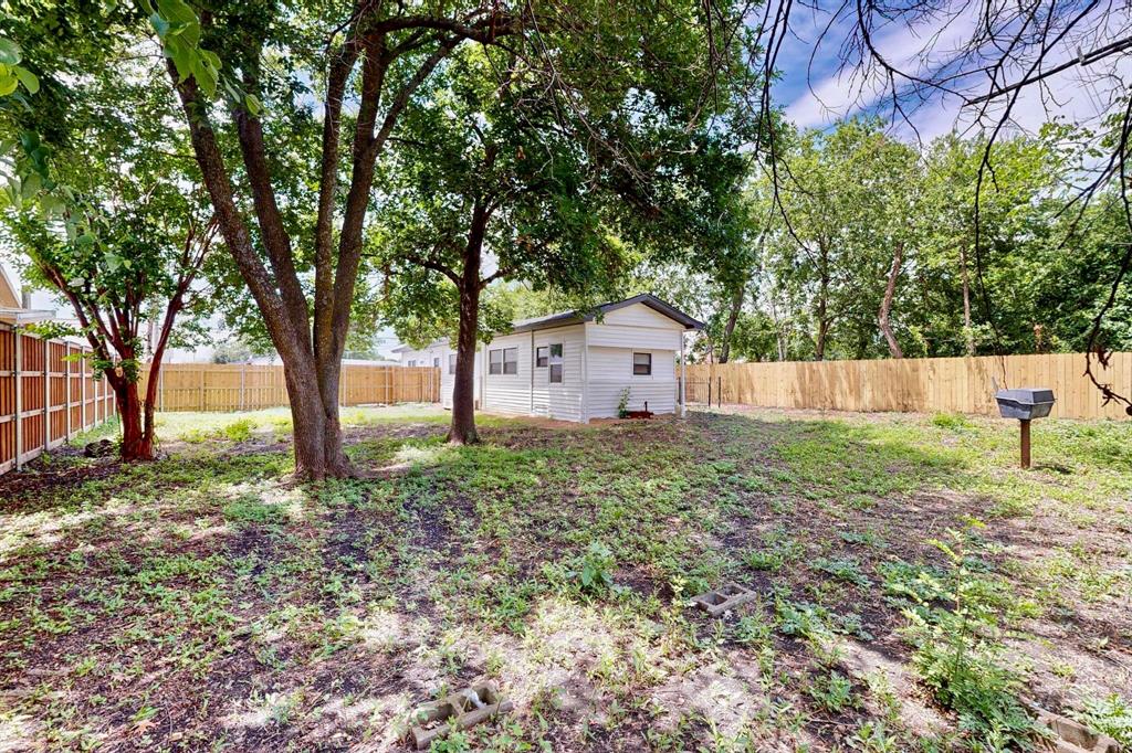 3112 Red River Street Melissa, TX 75454 - Photo 35 of 40 Fenced backyard with an outbuilding
