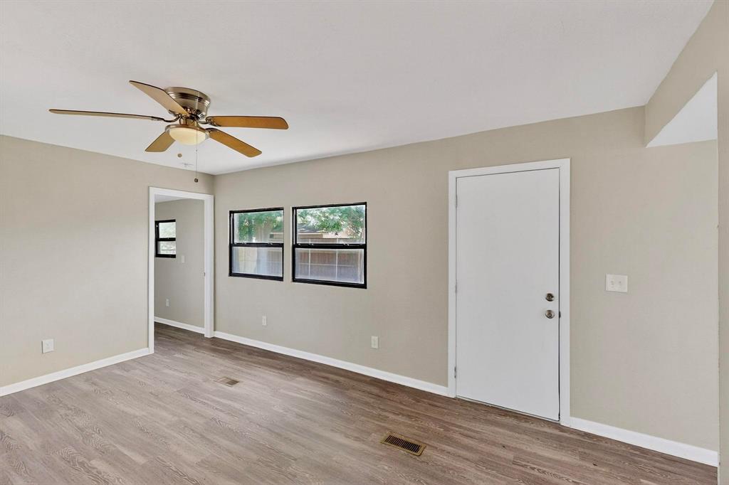 3112 Red River Street Melissa, TX 75454 - Photo 5 of 40 Spare room featuring light wood-style floors and a ceiling fan