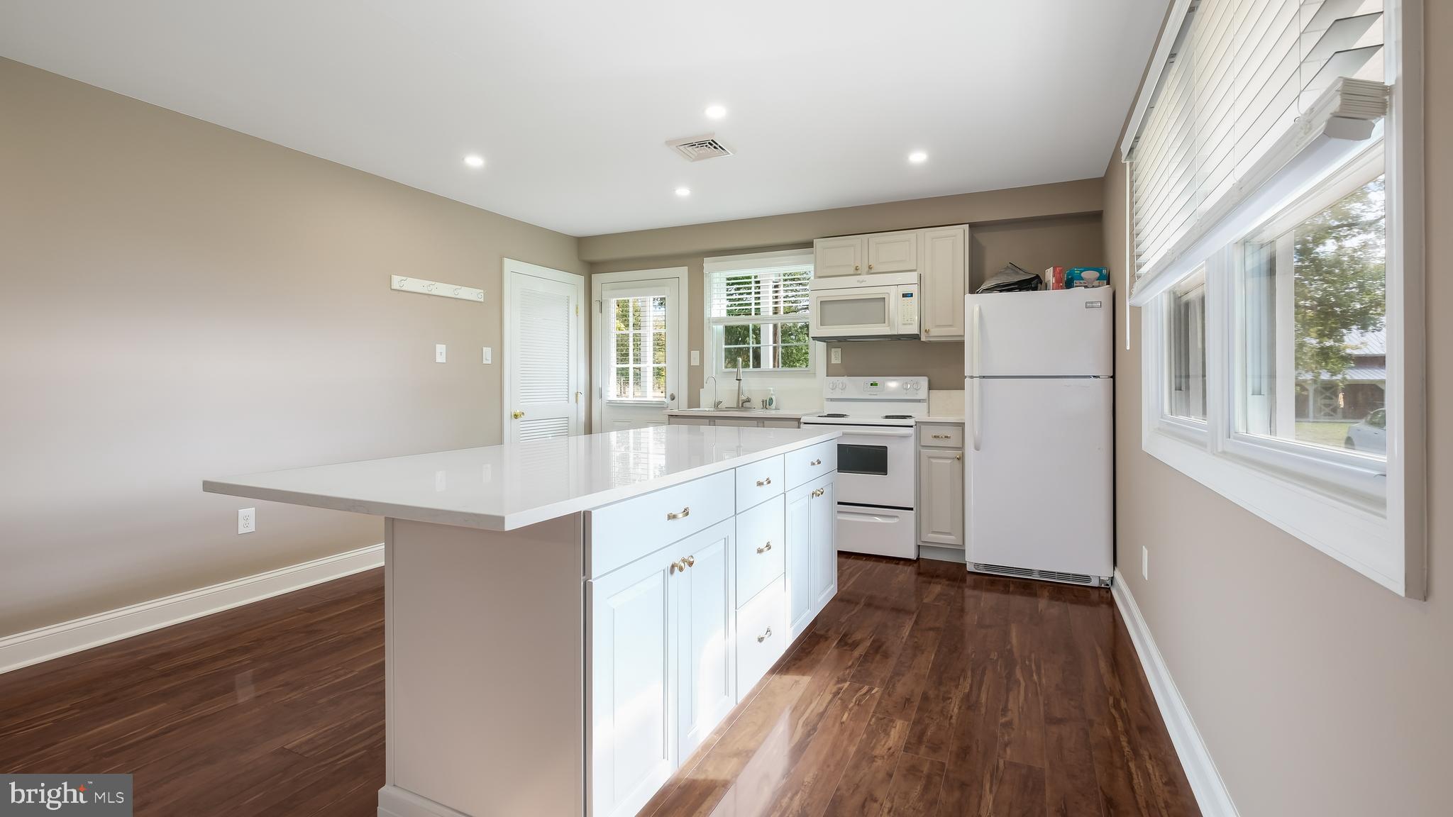 1732 Creek Road New Hope, PA 18938 - Photo 14 of 42 a kitchen with white cabinets and white appliances