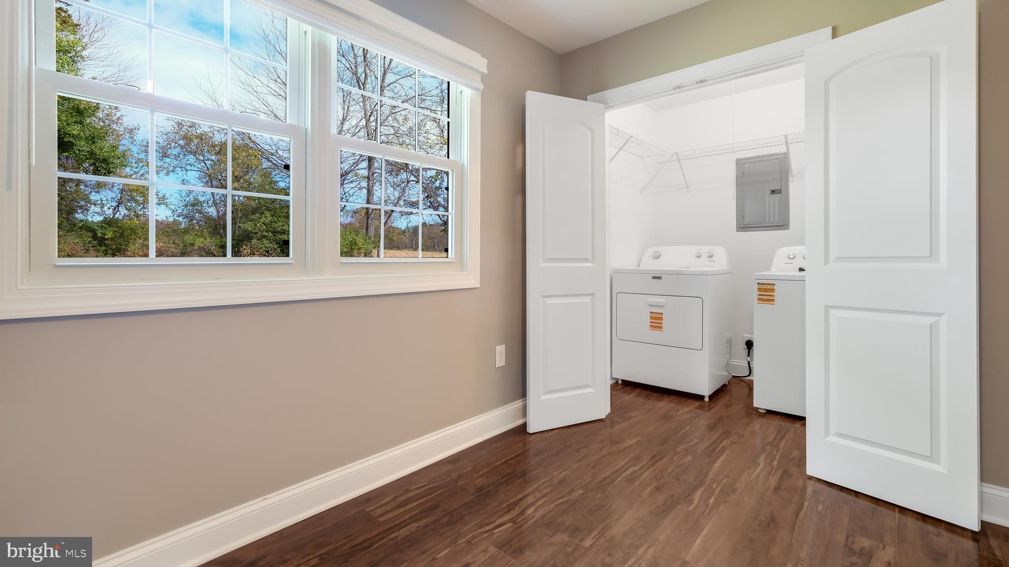 1732 Creek Road New Hope, PA 18938 - Photo 24 of 42 an empty room with wooden floor and windows