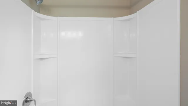 a close up of a white marble wall