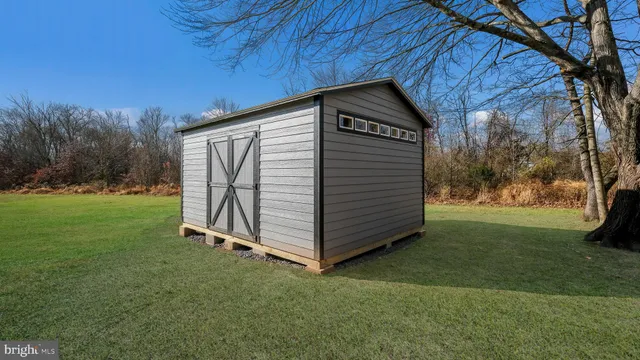 a view of backyard with green space