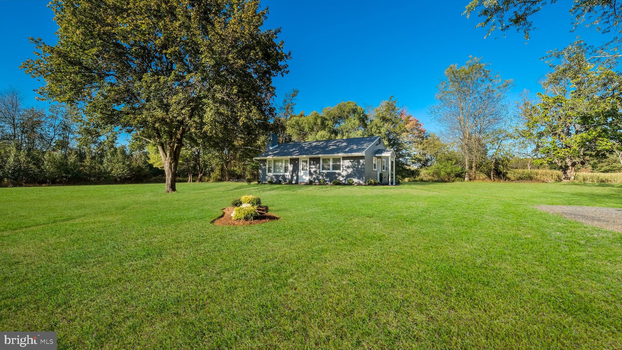 1732 Creek Road New Hope, PA 18938 - Photo 5 of 42 a view of a garden with a house in the background