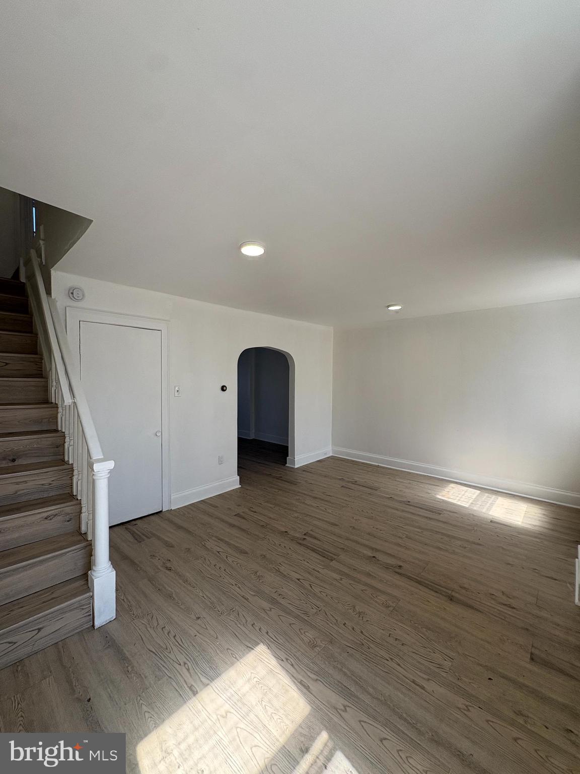2892 North Constitution Road Camden, NJ 08104 - Photo 2 of 17 a view of empty room with wooden floor