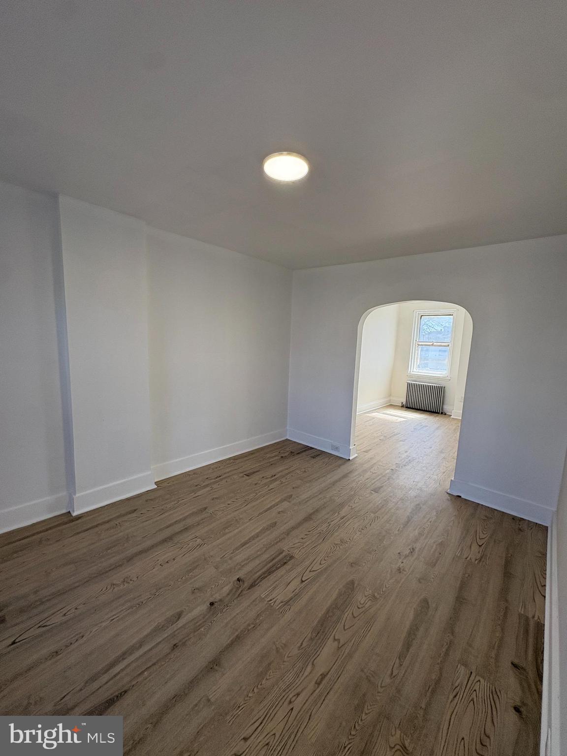 2892 North Constitution Road Camden, NJ 08104 - Photo 5 of 17 wooden floor in an empty room with wooden floor