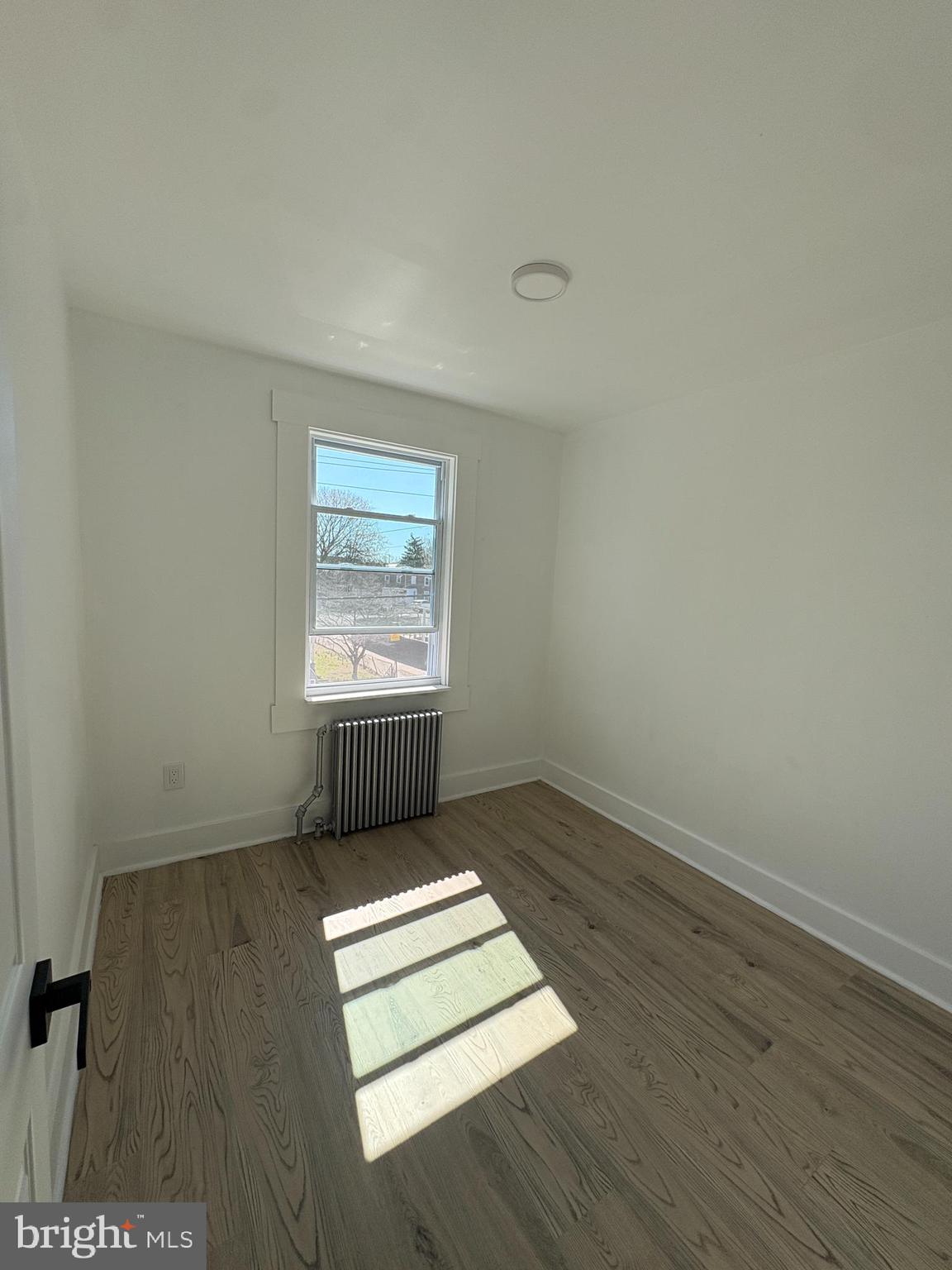 2892 North Constitution Road Camden, NJ 08104 - Photo 9 of 17 an empty room with windows